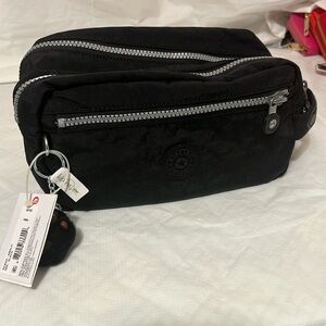 Brand new Kipling toiletries bag.